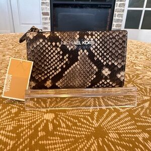 NWT Michael Kors Jet Set Travel small snap wallet snake-embossed pattern.